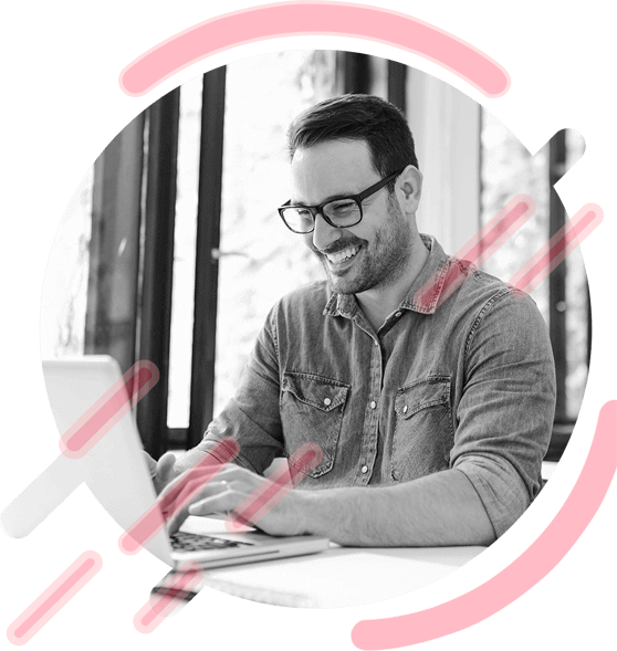 adult happy guy wearing specs working on his laptop, digital marketing agency, digital marketing agency in india, full service digital marketing agency, full digital marketing agency, internet marketing company, digital marketing agency india, digital marketing company in india, online marketing company in india